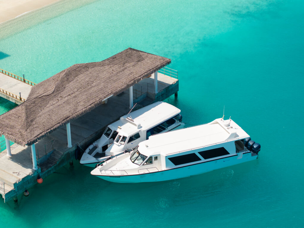 Seamless arrival by private speedboat transfer at a Maldives resort.
